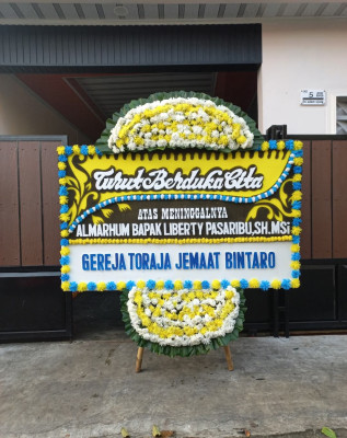 Papan Bunga Duka di Permata